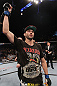 LAS VEGAS - FEBRUARY 04:  Carlos Condit receives the interim UFC welterweight championship belt after defeating Nick Diaz during the UFC 143 event at Mandalay Bay Events Center on February 4, 2012 in Las Vegas, Nevada.  (Photo by Nick Laham/Zuffa LLC/Zuffa LLC via Getty Images) *** Local Caption *** Carlos Condit