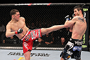 LAS VEGAS - FEBRUARY 04:  (L-R) Nick Diaz kicks Carlos Condit during the UFC 143 event at Mandalay Bay Events Center on February 4, 2012 in Las Vegas, Nevada.  (Photo by Nick Laham/Zuffa LLC/Zuffa LLC via Getty Images) *** Local Caption *** Nick Diaz; Carlos Condit