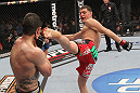 LAS VEGAS - FEBRUARY 04:  (R-L) Nick Diaz kicks Carlos Condit during the UFC 143 event at Mandalay Bay Events Center on February 4, 2012 in Las Vegas, Nevada.  (Photo by Nick Laham/Zuffa LLC/Zuffa LLC via Getty Images) *** Local Caption *** Nick Diaz; Carlos Condit