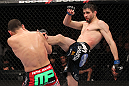 LAS VEGAS - FEBRUARY 04:  (R-L) Carlos Condit kicks Nick Diaz during the UFC 143 event at Mandalay Bay Events Center on February 4, 2012 in Las Vegas, Nevada.  (Photo by Nick Laham/Zuffa LLC/Zuffa LLC via Getty Images) *** Local Caption *** Carlos Condit; Nick Diaz