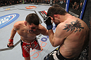 LAS VEGAS - FEBRUARY 04:  Nick Diaz (left) punches Carlos Condit during the UFC 143 event at Mandalay Bay Events Center on February 4, 2012 in Las Vegas, Nevada.  (Photo by Nick Laham/Zuffa LLC/Zuffa LLC via Getty Images) *** Local Caption *** Nick Diaz; Carlos Condit