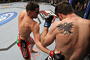 LAS VEGAS - FEBRUARY 04:  Nick Diaz (left) punches Carlos Condit during the UFC 143 event at Mandalay Bay Events Center on February 4, 2012 in Las Vegas, Nevada.  (Photo by Nick Laham/Zuffa LLC/Zuffa LLC via Getty Images) *** Local Caption *** Nick Diaz; Carlos Condit