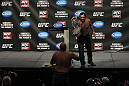 OMAHA, NE - FEBRUARY 14:  UFC fighter Johny Hendricks trades shirts with a fan during a Q&A session before the UFC on FUEL TV weigh in event at Omaha Civic Auditorium on February 14, 2012 in Omaha, Nebraska.  (Photo by Josh Hedges/Zuffa LLC/Zuffa LLC via Getty Images) *** Local Caption *** Johny Hendricks