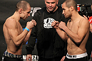 OMAHA, NE - FEBRUARY 14:  (L-R) Opponents Anton Kuivanen and Justin Salas face off after weighing in during the UFC on FUEL TV weigh in event at Omaha Civic Auditorium on February 14, 2012 in Omaha, Nebraska.  (Photo by Josh Hedges/Zuffa LLC/Zuffa LLC via Getty Images) *** Local Caption *** Anton Kuivanen; Justin Salas; Dana White