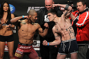 OMAHA, NE - FEBRUARY 14:  (L-R) Bantamweight opponents Ivan Menjivar and John Albert face off after weighing in during the UFC on FUEL TV weigh in event at Omaha Civic Auditorium on February 14, 2012 in Omaha, Nebraska.  (Photo by Josh Hedges/Zuffa LLC/Zuffa LLC via Getty Images) *** Local Caption *** Ivan Menjivar; John Albert; Dana White