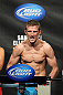 OMAHA, NE - FEBRUARY 14:  TJ Dillashaw weighs in during the UFC on FUEL TV weigh in event at Omaha Civic Auditorium on February 14, 2012 in Omaha, Nebraska.  (Photo by Josh Hedges/Zuffa LLC/Zuffa LLC via Getty Images) *** Local Caption *** TJ Dillashaw