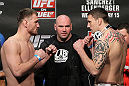 OMAHA, NE - FEBRUARY 14:  (L-R) Heavyweight opponents Stipe Miocic and Phil De Fries face off after weighing in during the UFC on FUEL TV weigh in event at Omaha Civic Auditorium on February 14, 2012 in Omaha, Nebraska.  (Photo by Josh Hedges/Zuffa LLC/Zuffa LLC via Getty Images) *** Local Caption *** Stipe Miocic; Phil De Fries; Dana White