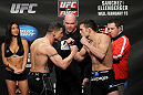 OMAHA, NE - FEBRUARY 14:  (L-R) Welterweight opponents Diego Sanchez and Jake Ellenberger face off after weighing in during the UFC on FUEL TV weigh in event at Omaha Civic Auditorium on February 14, 2012 in Omaha, Nebraska.  (Photo by Josh Hedges/Zuffa LLC/Zuffa LLC via Getty Images) *** Local Caption *** Diego Sanchez; Jake Ellenberger; Dana White
