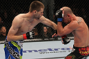 OMAHA, NE - FEBRUARY 15:  (L-R) Tim Means punches Bernardo Magalhaes during the UFC on FUEL TV event at Omaha Civic Auditorium on February 15, 2012 in Omaha, Nebraska.  (Photo by Josh Hedges/Zuffa LLC/Zuffa LLC via Getty Images) *** Local Caption *** Tim Means; Bernardo Magalhaes