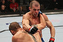 OMAHA, NE - FEBRUARY 15:  (L-R) Justin Salas and Anton Kuivanen trade punches during the UFC on FUEL TV event at Omaha Civic Auditorium on February 15, 2012 in Omaha, Nebraska.  (Photo by Josh Hedges/Zuffa LLC/Zuffa LLC via Getty Images) *** Local Caption *** Anton Kuivanen; Justin Salas