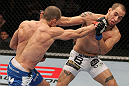 OMAHA, NE - FEBRUARY 15:  (L-R) Anton Kuivanen punches Justin Salas during the UFC on FUEL TV event at Omaha Civic Auditorium on February 15, 2012 in Omaha, Nebraska.  (Photo by Josh Hedges/Zuffa LLC/Zuffa LLC via Getty Images) *** Local Caption *** Anton Kuivanen; Justin Salas