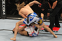OMAHA, NE - FEBRUARY 15:  (R-L) Jonathan Brookins knocks out Vagner Rocha with a punch on the ground during the UFC on FUEL TV event at Omaha Civic Auditorium on February 15, 2012 in Omaha, Nebraska.  (Photo by Josh Hedges/Zuffa LLC/Zuffa LLC via Getty Images) *** Local Caption *** Jonathan Brookins; Vagner Rocha