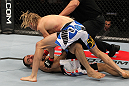 OMAHA, NE - FEBRUARY 15:  (R-L) Jonathan Brookins knocks out Vagner Rocha with a punch on the ground during the UFC on FUEL TV event at Omaha Civic Auditorium on February 15, 2012 in Omaha, Nebraska.  (Photo by Josh Hedges/Zuffa LLC/Zuffa LLC via Getty Images) *** Local Caption *** Jonathan Brookins; Vagner Rocha