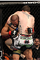 OMAHA, NE - FEBRUARY 15:  (R-L) John Albert attempts a guillotine choke submission against Ivan Menjivar during the UFC on FUEL TV event at Omaha Civic Auditorium on February 15, 2012 in Omaha, Nebraska.  (Photo by Josh Hedges/Zuffa LLC/Zuffa LLC via Getty Images) *** Local Caption *** Ivan Menjivar; John Albert
