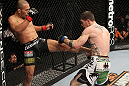OMAHA, NE - FEBRUARY 15:  (L-R) Ivan Menjivar kicks John Albert during the UFC on FUEL TV event at Omaha Civic Auditorium on February 15, 2012 in Omaha, Nebraska.  (Photo by Josh Hedges/Zuffa LLC/Zuffa LLC via Getty Images) *** Local Caption *** Ivan Menjivar; John Albert