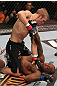 OMAHA, NE - FEBRUARY 15:  TJ Dillashaw punches down at Walel Watson on the ground during the UFC on FUEL TV event at Omaha Civic Auditorium on February 15, 2012 in Omaha, Nebraska.  (Photo by Josh Hedges/Zuffa LLC/Zuffa LLC via Getty Images) *** Local Caption *** TJ Dillashaw; Walel Watson