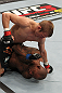 OMAHA, NE - FEBRUARY 15:  TJ Dillashaw punches down at Walel Watson on the ground during the UFC on FUEL TV event at Omaha Civic Auditorium on February 15, 2012 in Omaha, Nebraska.  (Photo by Josh Hedges/Zuffa LLC/Zuffa LLC via Getty Images) *** Local Caption *** TJ Dillashaw; Walel Watson