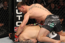 OMAHA, NE - FEBRUARY 15:  (R-L) Stipe Miocic punches Phil De Fries during the UFC on FUEL TV event at Omaha Civic Auditorium on February 15, 2012 in Omaha, Nebraska.  (Photo by Josh Hedges/Zuffa LLC/Zuffa LLC via Getty Images) *** Local Caption *** Stipe Miocic; Phil De Fries