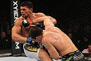 OMAHA, NE - FEBRUARY 15:  (R-L) Aaron Simpson punches Ronny Markes during the UFC on FUEL TV event at Omaha Civic Auditorium on February 15, 2012 in Omaha, Nebraska.  (Photo by Josh Hedges/Zuffa LLC/Zuffa LLC via Getty Images) *** Local Caption *** Aaron Simpson; Ronny Markes