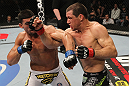 OMAHA, NE - FEBRUARY 15:  (R-L) Aaron Simpson and Ronny Markes trade punches during the UFC on FUEL TV event at Omaha Civic Auditorium on February 15, 2012 in Omaha, Nebraska.  (Photo by Josh Hedges/Zuffa LLC/Zuffa LLC via Getty Images) *** Local Caption *** Aaron Simpson; Ronny Markes