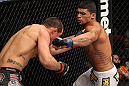 OMAHA, NE - FEBRUARY 15:  (R-L) Ronny Markes punches Aaron Simpson during the UFC on FUEL TV event at Omaha Civic Auditorium on February 15, 2012 in Omaha, Nebraska.  (Photo by Josh Hedges/Zuffa LLC/Zuffa LLC via Getty Images) *** Local Caption *** Aaron Simpson; Ronny Markes