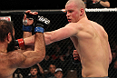 OMAHA, NE - FEBRUARY 15:  (R-L) Stefan Struve punches Dave Herman during the UFC on FUEL TV event at Omaha Civic Auditorium on February 15, 2012 in Omaha, Nebraska.  (Photo by Josh Hedges/Zuffa LLC/Zuffa LLC via Getty Images) *** Local Caption *** Stefan Struve; Dave Herman