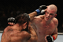 OMAHA, NE - FEBRUARY 15:  (R-L) Stefan Struve punches Dave Herman during the UFC on FUEL TV event at Omaha Civic Auditorium on February 15, 2012 in Omaha, Nebraska.  (Photo by Josh Hedges/Zuffa LLC/Zuffa LLC via Getty Images) *** Local Caption *** Stefan Struve; Dave Herman