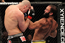 OMAHA, NE - FEBRUARY 15:  (R-L) Dave Herman punches Stefan Struve during the UFC on FUEL TV event at Omaha Civic Auditorium on February 15, 2012 in Omaha, Nebraska.  (Photo by Josh Hedges/Zuffa LLC/Zuffa LLC via Getty Images) *** Local Caption *** Stefan Struve; Dave Herman