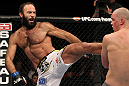 OMAHA, NE - FEBRUARY 15:  (L-R) Dave Herman kicks Stefan Struve during the UFC on FUEL TV event at Omaha Civic Auditorium on February 15, 2012 in Omaha, Nebraska.  (Photo by Josh Hedges/Zuffa LLC/Zuffa LLC via Getty Images) *** Local Caption *** Stefan Struve; Dave Herman