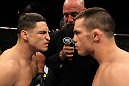 OMAHA, NE - FEBRUARY 15:  Opponents Diego Sanchez (L) and Jake Ellenberger (R) face off before their main event bout during the UFC on FUEL TV event at Omaha Civic Auditorium on February 15, 2012 in Omaha, Nebraska.  (Photo by Josh Hedges/Zuffa LLC/Zuffa LLC via Getty Images) *** Local Caption *** Jake Ellenberger; Diego Sanchez