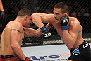 OMAHA, NE - FEBRUARY 15:  (R-L) Jake Ellenberger elbows Diego Sanchez during the UFC on FUEL TV event at Omaha Civic Auditorium on February 15, 2012 in Omaha, Nebraska.  (Photo by Josh Hedges/Zuffa LLC/Zuffa LLC via Getty Images) *** Local Caption *** Jake Ellenberger; Diego Sanchez