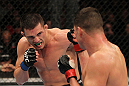 OMAHA, NE - FEBRUARY 15:  (L-R) Jake Ellenberger punches Diego Sanchez during the UFC on FUEL TV event at Omaha Civic Auditorium on February 15, 2012 in Omaha, Nebraska.  (Photo by Josh Hedges/Zuffa LLC/Zuffa LLC via Getty Images) *** Local Caption *** Jake Ellenberger; Diego Sanchez