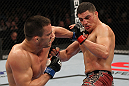 OMAHA, NE - FEBRUARY 15:  (L-R) Jake Ellenberger punches Diego Sanchez during the UFC on FUEL TV event at Omaha Civic Auditorium on February 15, 2012 in Omaha, Nebraska.  (Photo by Josh Hedges/Zuffa LLC/Zuffa LLC via Getty Images) *** Local Caption *** Jake Ellenberger; Diego Sanchez
