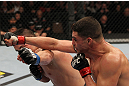 OMAHA, NE - FEBRUARY 15:  (L-R) Jake Ellenberger and Diego Sanchez trade punches during the UFC on FUEL TV event at Omaha Civic Auditorium on February 15, 2012 in Omaha, Nebraska.  (Photo by Josh Hedges/Zuffa LLC/Zuffa LLC via Getty Images) *** Local Caption *** Jake Ellenberger; Diego Sanchez
