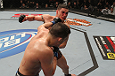 OMAHA, NE - FEBRUARY 15:  (R-L) Jake Ellenberger punches Diego Sanchez during the UFC on FUEL TV event at Omaha Civic Auditorium on February 15, 2012 in Omaha, Nebraska.  (Photo by Josh Hedges/Zuffa LLC/Zuffa LLC via Getty Images) *** Local Caption *** Jake Ellenberger; Diego Sanchez