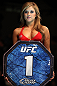OMAHA, NE - FEBRUARY 15:  UFC Octagon Girl Brittney Palmer introduces round one before the Brookins v Rocha bout during the UFC on FUEL TV event at Omaha Civic Auditorium on February 15, 2012 in Omaha, Nebraska.  (Photo by Josh Hedges/Zuffa LLC/Zuffa LLC via Getty Images) *** Local Caption *** Brittney Palmer