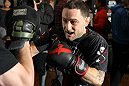 TOKYO, JAPAN - FEBRUARY 22:  UFC Lightweight Champion Frankie Edgar works out for the media during the UFC 144 open workouts at Gold's Gym on February 22, 2012 in Tokyo, Japan.  (Photo by Josh Hedges/Zuffa LLC/Zuffa LLC via Getty Images) *** Local Caption *** Frankie Edgar