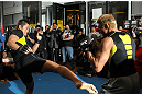 TOKYO, JAPAN - FEBRUARY 22:  Yoshihiro Akiyama (R) and Dong Hyun Kim (L) work out for the media during the UFC 144 open workouts at Gold's Gym on February 22, 2012 in Tokyo, Japan.  (Photo by Josh Hedges/Zuffa LLC/Zuffa LLC via Getty Images) *** Local Caption *** Yoshihiro Akiyama; Dong Hyun Kim