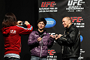 SAITAMA, JAPAN - FEBRUARY 25:  UFC Welterweight Champion Georges St-Pierre poses for photos with fans before the official UFC 144 weigh in at the Saitama Super Arena on February 25, 2012 in Saitama, Japan.  (Photo by Josh Hedges/Zuffa LLC/Zuffa LLC via Getty Images) *** Local Caption *** Georges St-Pierre