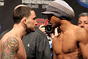 SAITAMA, JAPAN - FEBRUARY 25:  (L-R) UFC Lightweight Champion Frankie Edgar and challenger Benson Henderson face off after weighing in during the official UFC 144 weigh in at the Saitama Super Arena on February 25, 2012 in Saitama, Japan.  (Photo by Josh Hedges/Zuffa LLC/Zuffa LLC via Getty Images) *** Local Caption *** Benson Henderson; Frankie Edgar
