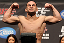 SAITAMA, JAPAN - FEBRUARY 25:  UFC Lightweight Champion Frankie Edgar weighs in during the official UFC 144 weigh in at the Saitama Super Arena on February 25, 2012 in Saitama, Japan.  (Photo by Josh Hedges/Zuffa LLC/Zuffa LLC via Getty Images) *** Local Caption *** Frankie Edgar