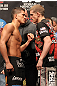 SAITAMA, JAPAN - FEBRUARY 25:  (L-R) Lightweight opponents Anthony Pettis and Joe Lauzon face off after weighing in during the official UFC 144 weigh in at the Saitama Super Arena on February 25, 2012 in Saitama, Japan.  (Photo by Josh Hedges/Zuffa LLC/Zuffa LLC via Getty Images) *** Local Caption *** Anthony Pettis; Joe Lauzon