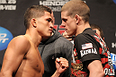 SAITAMA, JAPAN - FEBRUARY 25:  (L-R) Lightweight opponents Anthony Pettis and Joe Lauzon face off after weighing in during the official UFC 144 weigh in at the Saitama Super Arena on February 25, 2012 in Saitama, Japan.  (Photo by Josh Hedges/Zuffa LLC/Zuffa LLC via Getty Images) *** Local Caption *** Anthony Pettis; Joe Lauzon