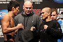 SAITAMA, JAPAN - FEBRUARY 25:  (L-R) Opponents Takeya Mizugaki and Chris Cariaso face off after weighing in during the official UFC 144 weigh in at the Saitama Super Arena on February 25, 2012 in Saitama, Japan.  (Photo by Josh Hedges/Zuffa LLC/Zuffa LLC via Getty Images) *** Local Caption *** Takeya Mizugaki; Chris Cariaso; Dana White