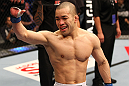 SAITAMA, JAPAN - FEBRUARY 26:  Issei Tamura reacts after knocking out Tiequan Zhang during the UFC 144 event at Saitama Super Arena on February 26, 2012 in Saitama, Japan.  (Photo by Al Bello/Zuffa LLC/Zuffa LLC via Getty Images) *** Local Caption *** Issei Tamura