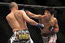 SAITAMA, JAPAN - FEBRUARY 26:  (R-L) Takeya Mizugaki punches Chris Cariaso during the UFC 144 event at Saitama Super Arena on February 26, 2012 in Saitama, Japan.  (Photo by Josh Hedges/Zuffa LLC/Zuffa LLC via Getty Images) *** Local Caption *** Takeya Mizugaki; Chris Cariaso