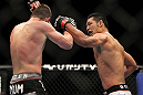 SAITAMA, JAPAN - FEBRUARY 26:  (R-L) RIki Fukuda punches Steve Cantwell during the UFC 144 event at Saitama Super Arena on February 26, 2012 in Saitama, Japan.  (Photo by Josh Hedges/Zuffa LLC/Zuffa LLC via Getty Images) *** Local Caption *** Riki Fukuda; Steve Cantwell