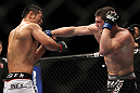 SAITAMA, JAPAN - FEBRUARY 26:  (R-L) Steve Cantwell punches Riki Fukuda during the UFC 144 event at Saitama Super Arena on February 26, 2012 in Saitama, Japan.  (Photo by Josh Hedges/Zuffa LLC/Zuffa LLC via Getty Images) *** Local Caption *** Riki Fukuda; Steve Cantwell
