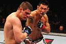 SAITAMA, JAPAN - FEBRUARY 26:  (R-L) RIki Fukuda punches Steve Cantwell during the UFC 144 event at Saitama Super Arena on February 26, 2012 in Saitama, Japan.  (Photo by Al Bello/Zuffa LLC/Zuffa LLC via Getty Images) *** Local Caption *** Riki Fukuda; Steve Cantwell