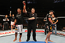 SAITAMA, JAPAN - FEBRUARY 26:  Riki Fukuda (L) reacts after defeating Steve Cantwell (R) by decision during the UFC 144 event at Saitama Super Arena on February 26, 2012 in Saitama, Japan.  (Photo by Al Bello/Zuffa LLC/Zuffa LLC via Getty Images) *** Local Caption *** Riki Fukuda; Steve Cantwell